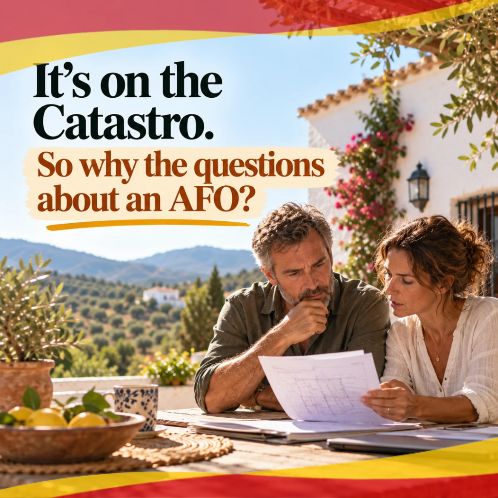 Couple reviewing paperwork at a rural Andalusian home, with the text: “It’s on the Catastro. So why the questions about an AFO?